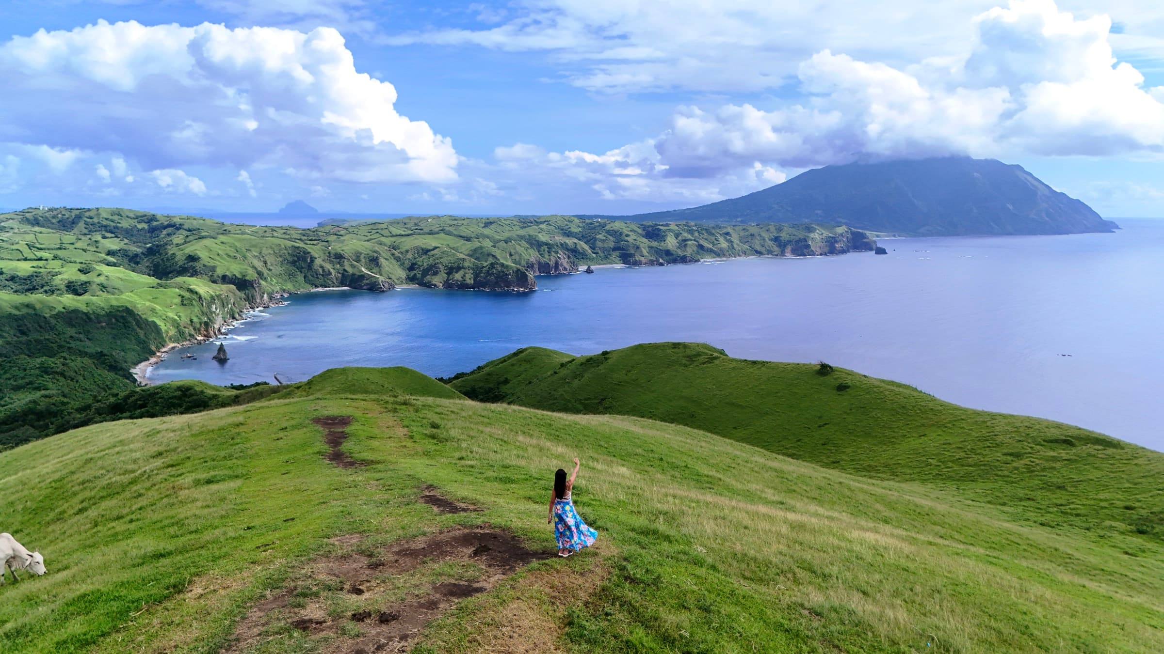 Rolling green hills and coastline on Batan Island