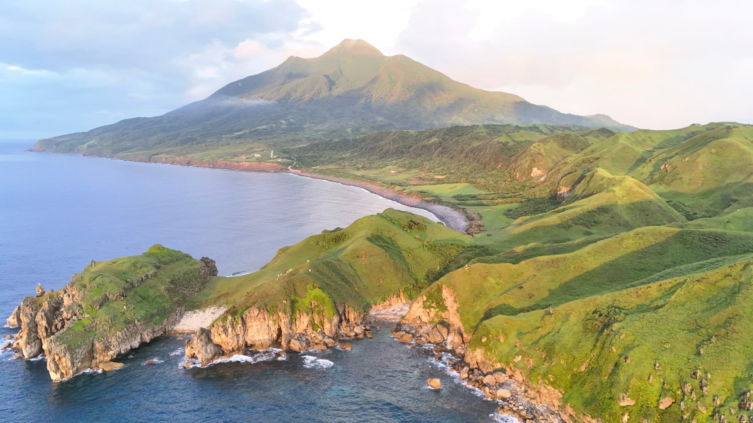 Mt. Iraya rising over the Batanes landscape